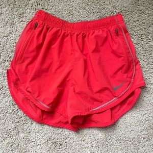 Red Nike shorts